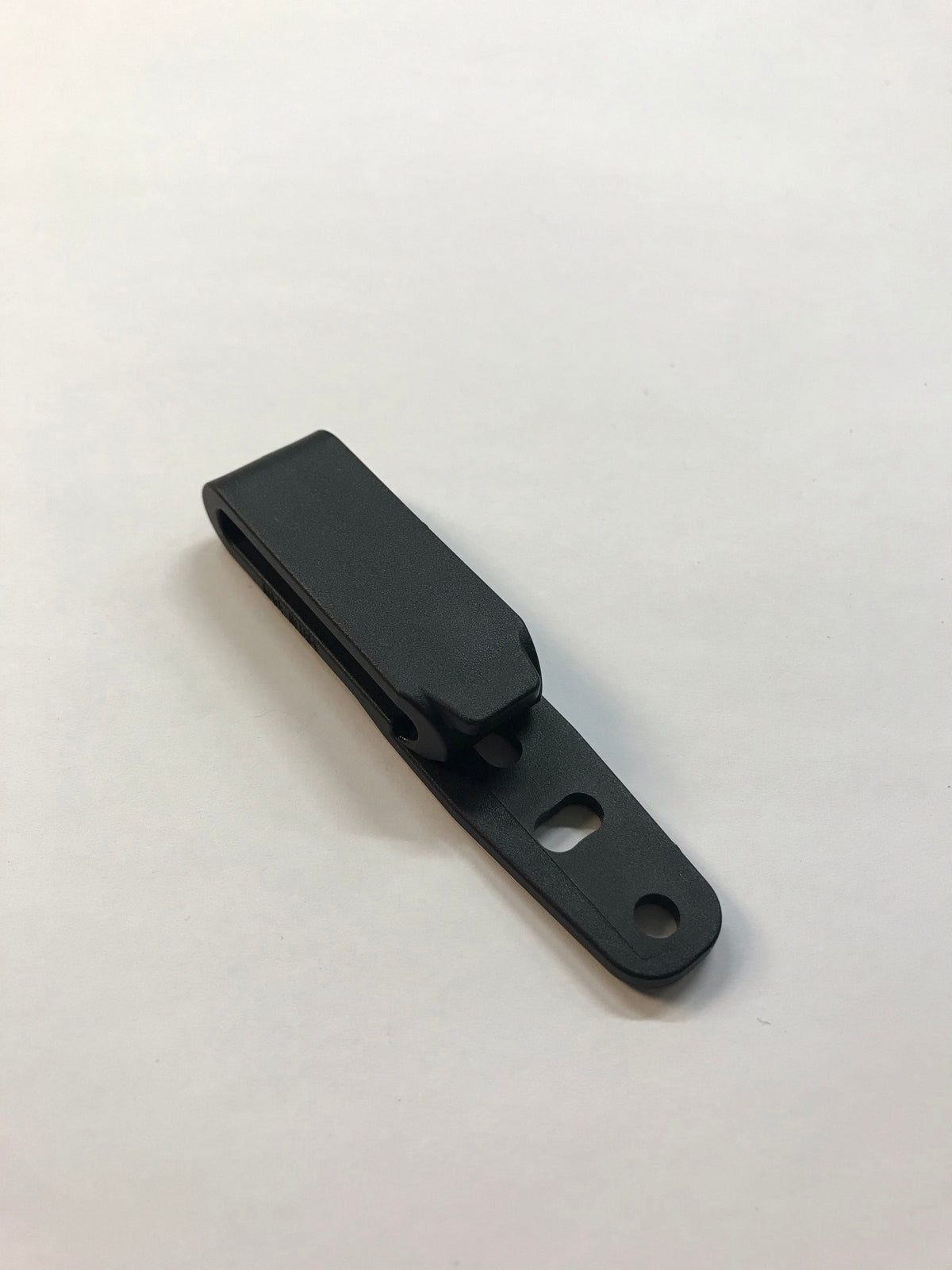 Fixation de ceinture pour étui